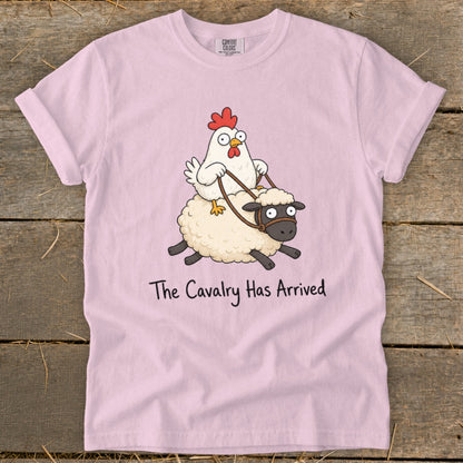 Pink t-shirt with cartoon chicken riding a sheep, text reads "The Cavalry Has Arrived".