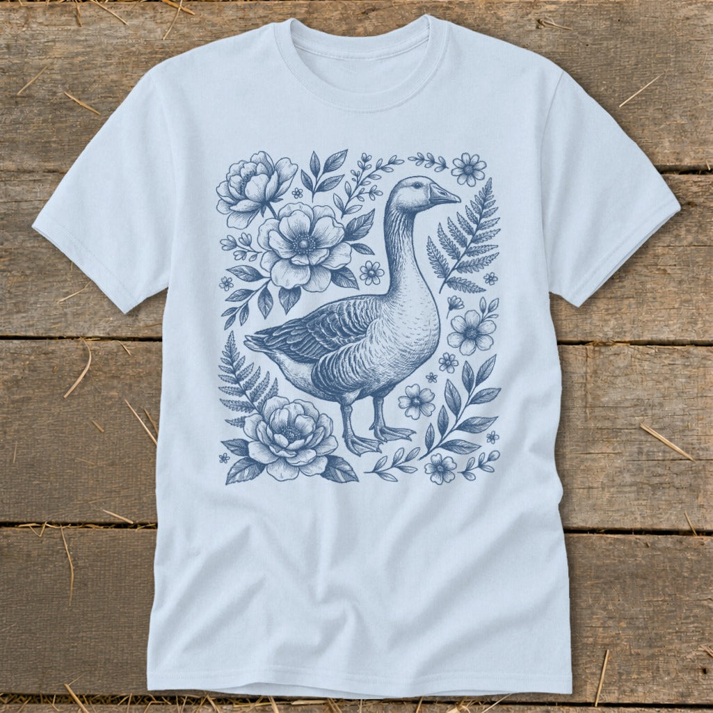 Light blue t-shirt with a vintage-style goose and floral sketch design.