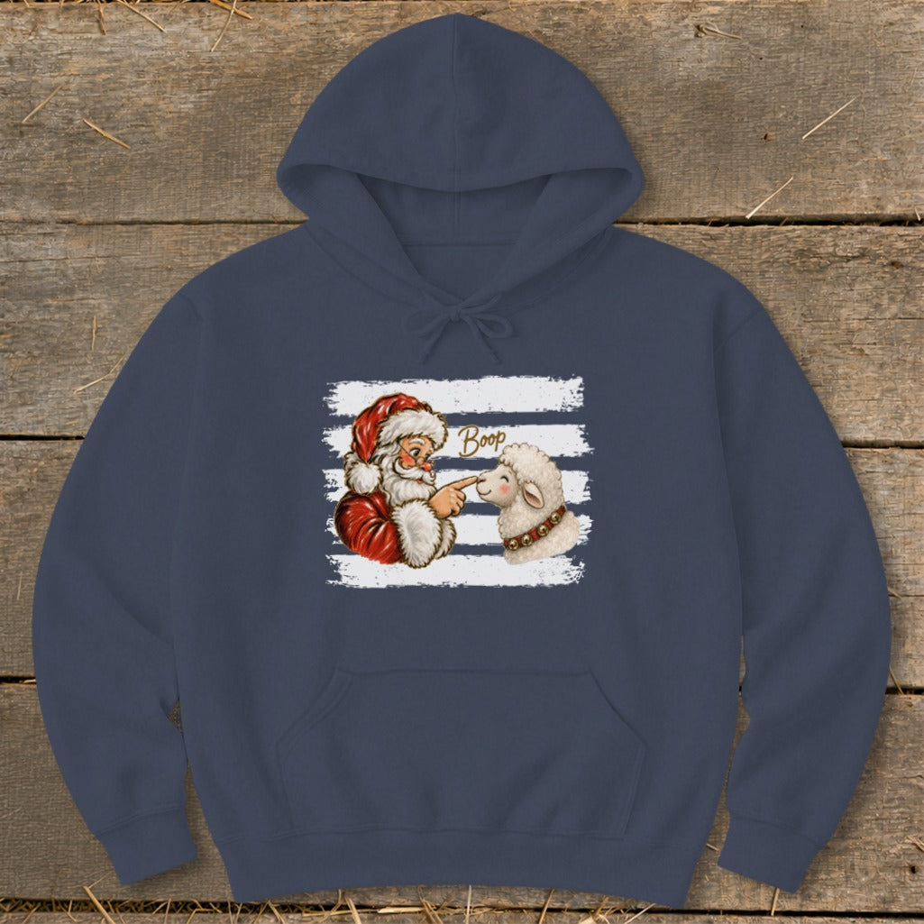 Santa booping a sheep on the nose with "Boop" text on a striped background.
