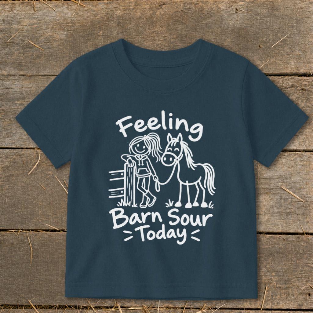 White text and drawing of a girl and horse on a navy blue t-shirt.