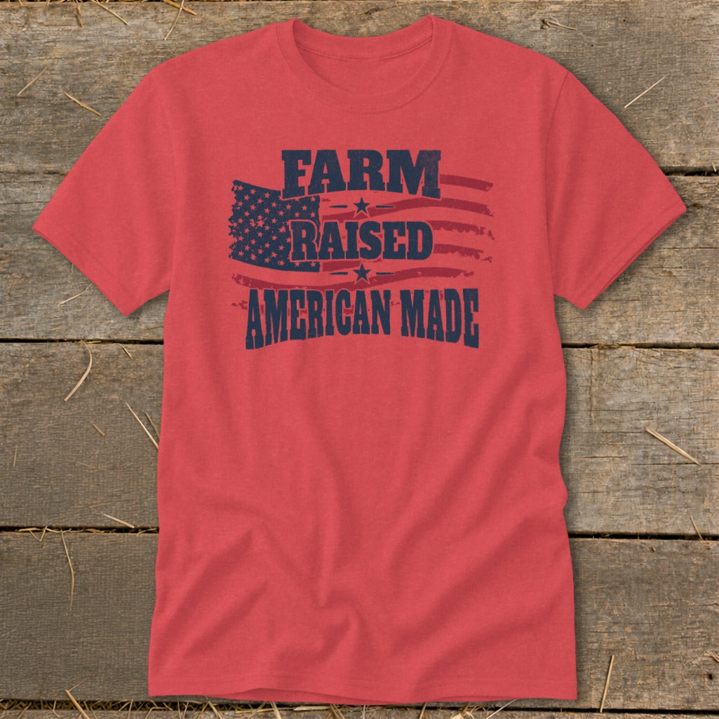 Red t-shirt with distressed American flag graphic and text "FARM RAISED AMERICAN MADE".
