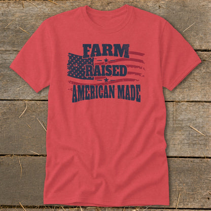 Red t-shirt with distressed American flag graphic and text "FARM RAISED AMERICAN MADE".