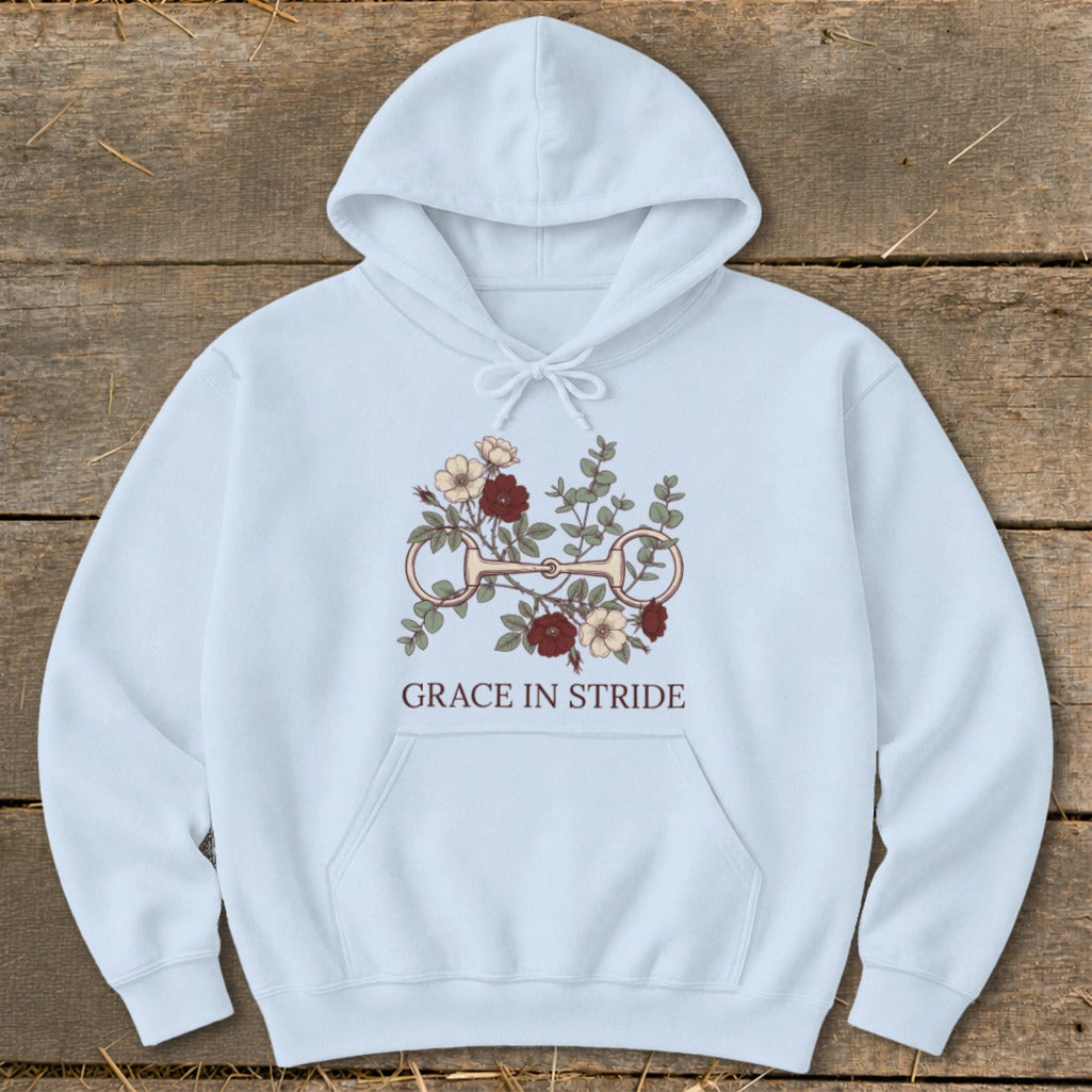 Light blue hoodie with floral horse bit design and "Grace In Stride" text.