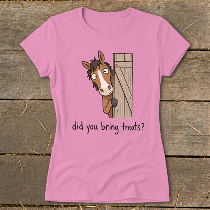 Pink t-shirt with cartoon horse peeking from a wooden door, asking "did you bring treats?"