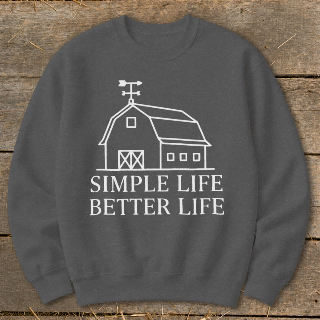 Dark gray sweatshirt with white barn graphic and text "SIMPLE LIFE BETTER LIFE".