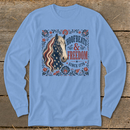 Light blue long-sleeve shirt with American flag-maned horse and "Hoofbeats & Freedom Since 1776" text.