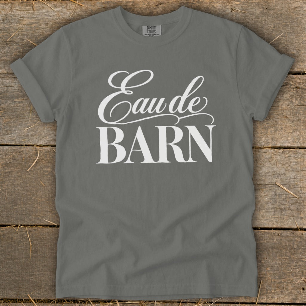 Grey t-shirt with white text "Eau de BARN" and "COMFORT COLORS" tag.