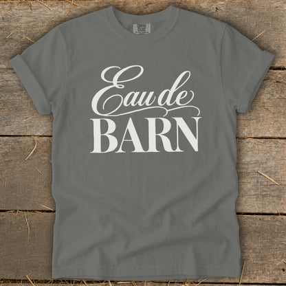 Grey t-shirt with white text "Eau de BARN" and "COMFORT COLORS" tag.