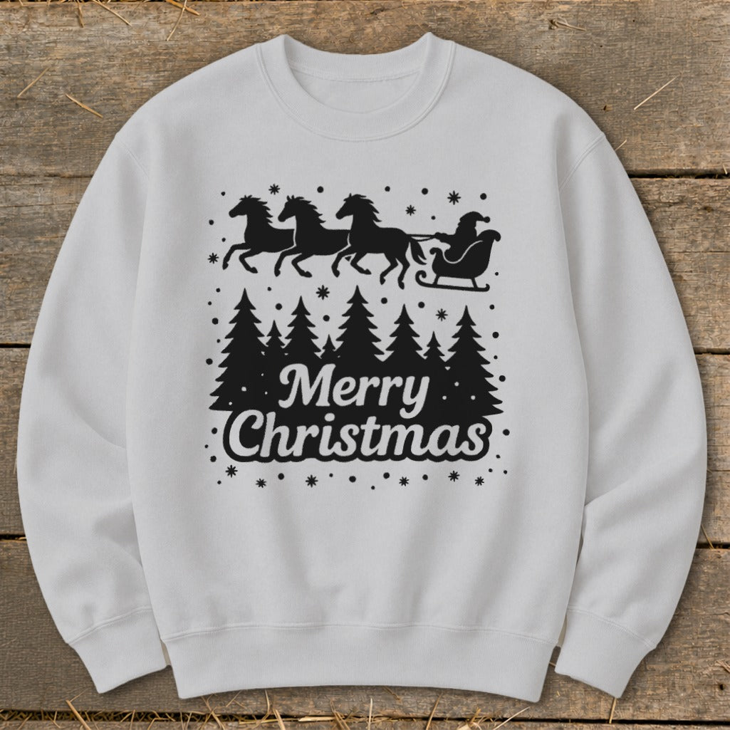 White sweatshirt with black Christmas design: Santa's sleigh pulled by horses over trees.