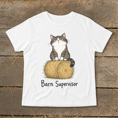 White t-shirt with a grumpy cat sitting on a bale of hay, text reads "Barn Supervisor".