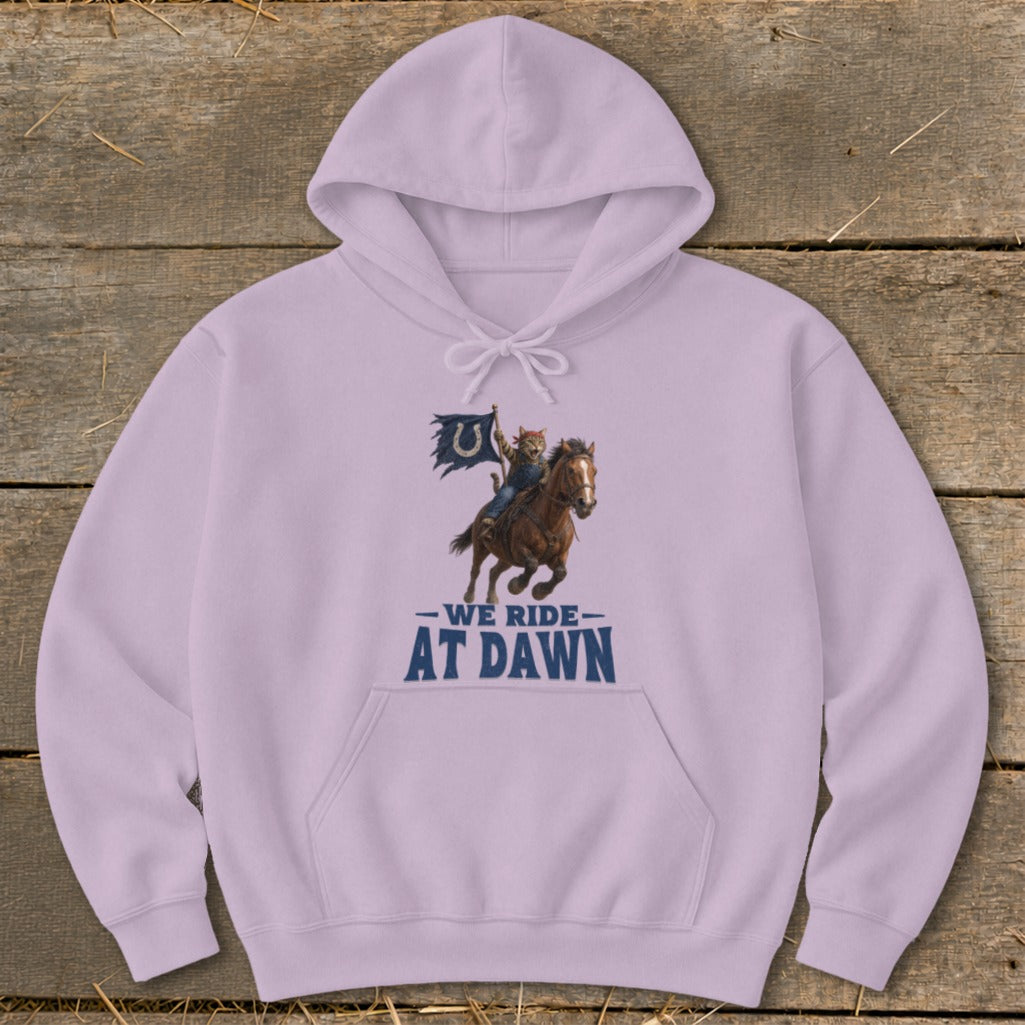 Light purple hoodie with graphic of cat riding horse, holding a flag, and text "We Ride At Dawn."