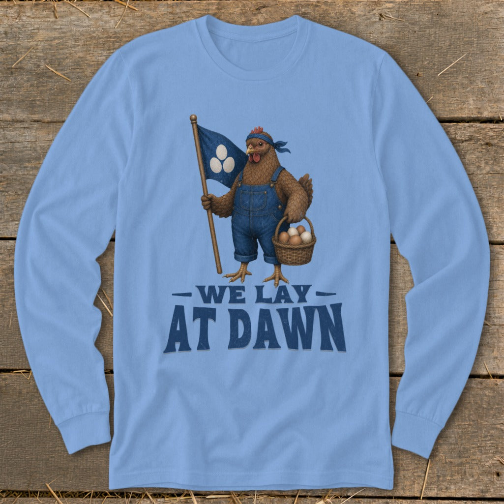Chicken in overalls holding a flag and basket of eggs with text "We Lay At Dawn".