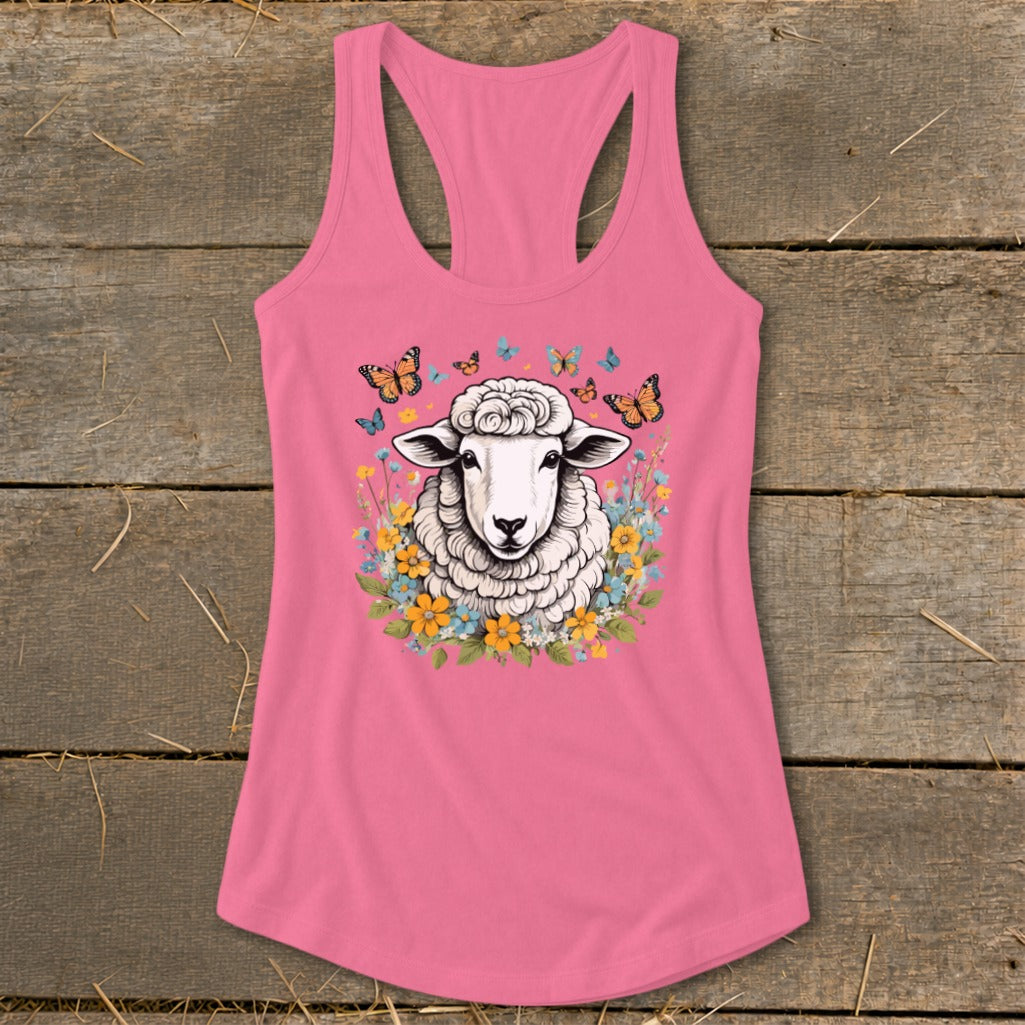 Pink racerback tank top with sheep, flowers, and butterflies graphic.