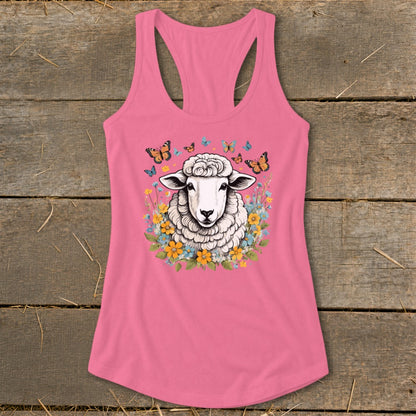 Pink racerback tank top with sheep, flowers, and butterflies graphic.