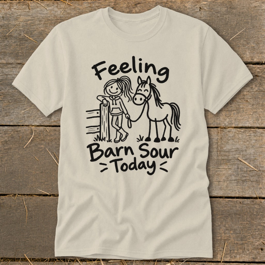 T-shirt with black graphic of a girl, horse, fence, and text "Feeling Barn Sour Today".