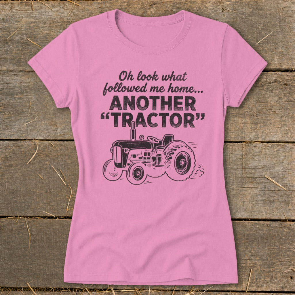 Pink t-shirt with "Oh look what followed me home... ANOTHER 'TRACTOR'" and a tractor graphic.