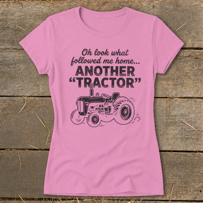 Pink t-shirt with "Oh look what followed me home... ANOTHER 'TRACTOR'" and a tractor graphic.