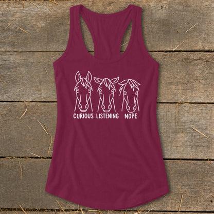 Maroon racerback tank top featuring three white horse head line drawings with the text curious listening nope.