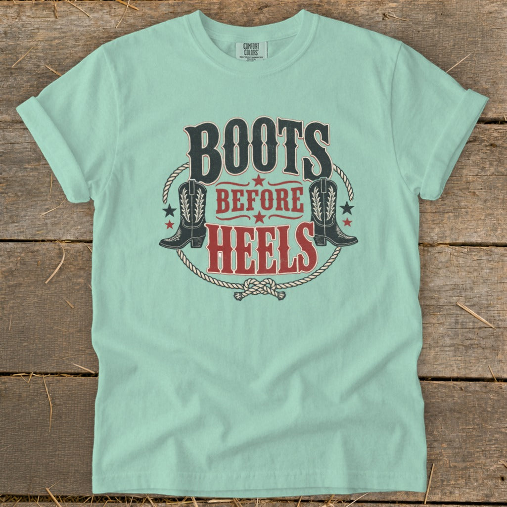 Mint t-shirt with "Boots Before Heels" text and cowboy boot graphics.