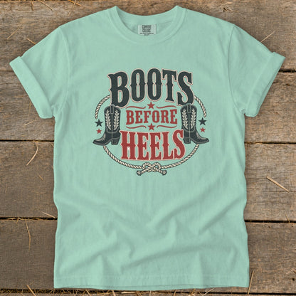 Mint t-shirt with "Boots Before Heels" text and cowboy boot graphics.