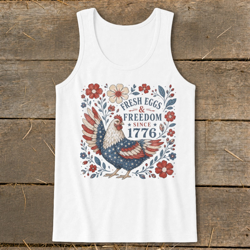 White tank top with chicken art and text "Fresh Eggs & Freedom Since 1776".