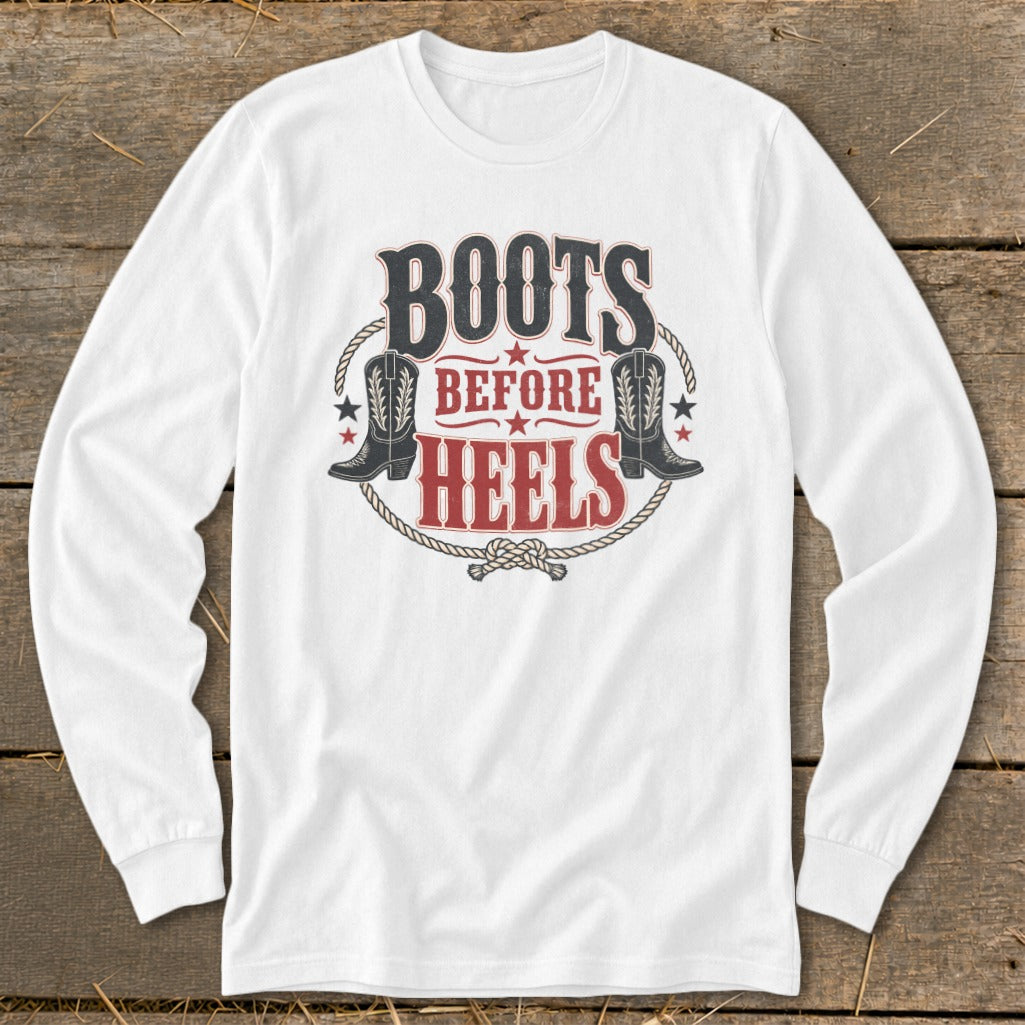 White long sleeve shirt with "Boots Before Heels" graphic and cowboy boots.