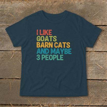 Navy t-shirt with "I LIKE GOATS BARN CATS AND MAYBE 3 PEOPLE" text in retro colors.