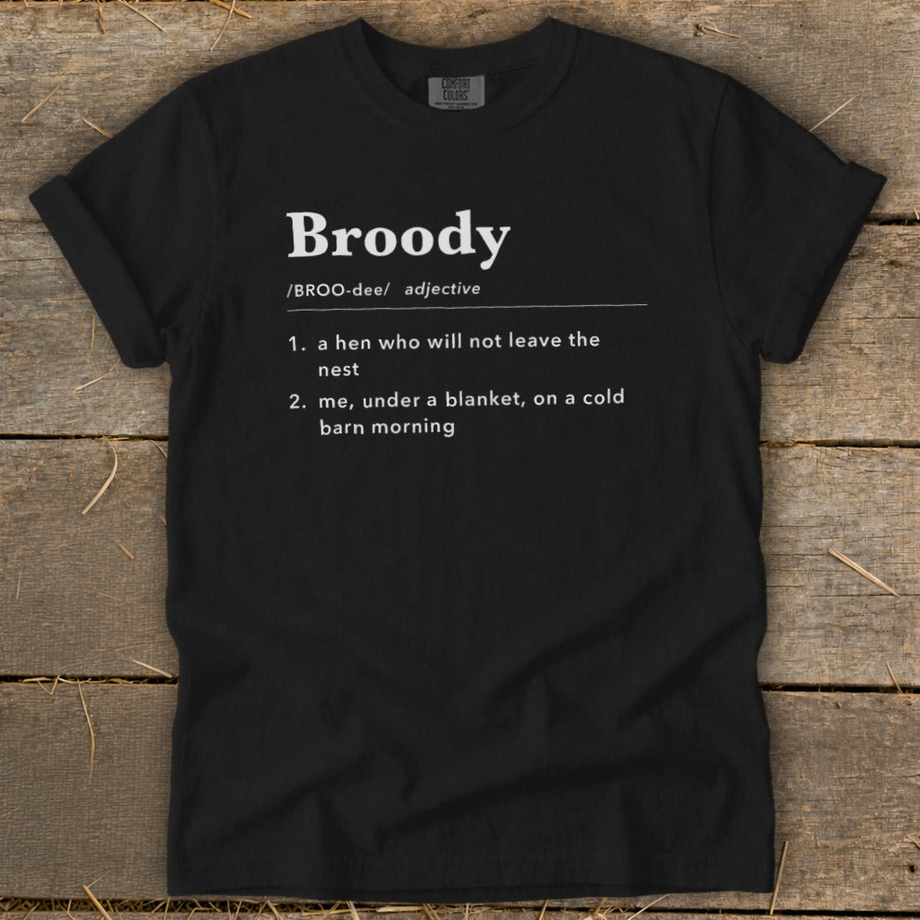 Black t-shirt with "Broody" definition: a hen not leaving the nest or me under a blanket.