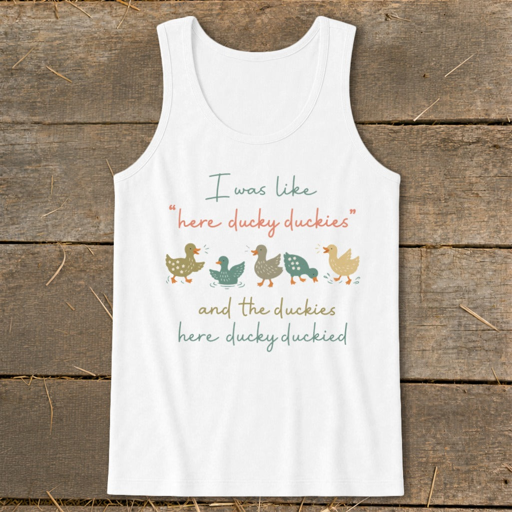 White tank top with cartoon ducks and text "I was like "here ducky duckies" and the duckies here ducky duckied".