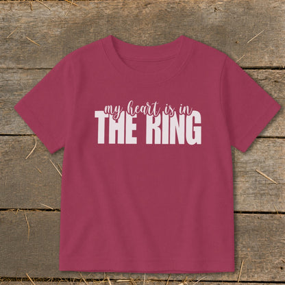 Maroon t-shirt with white text "my heart is in THE RING."