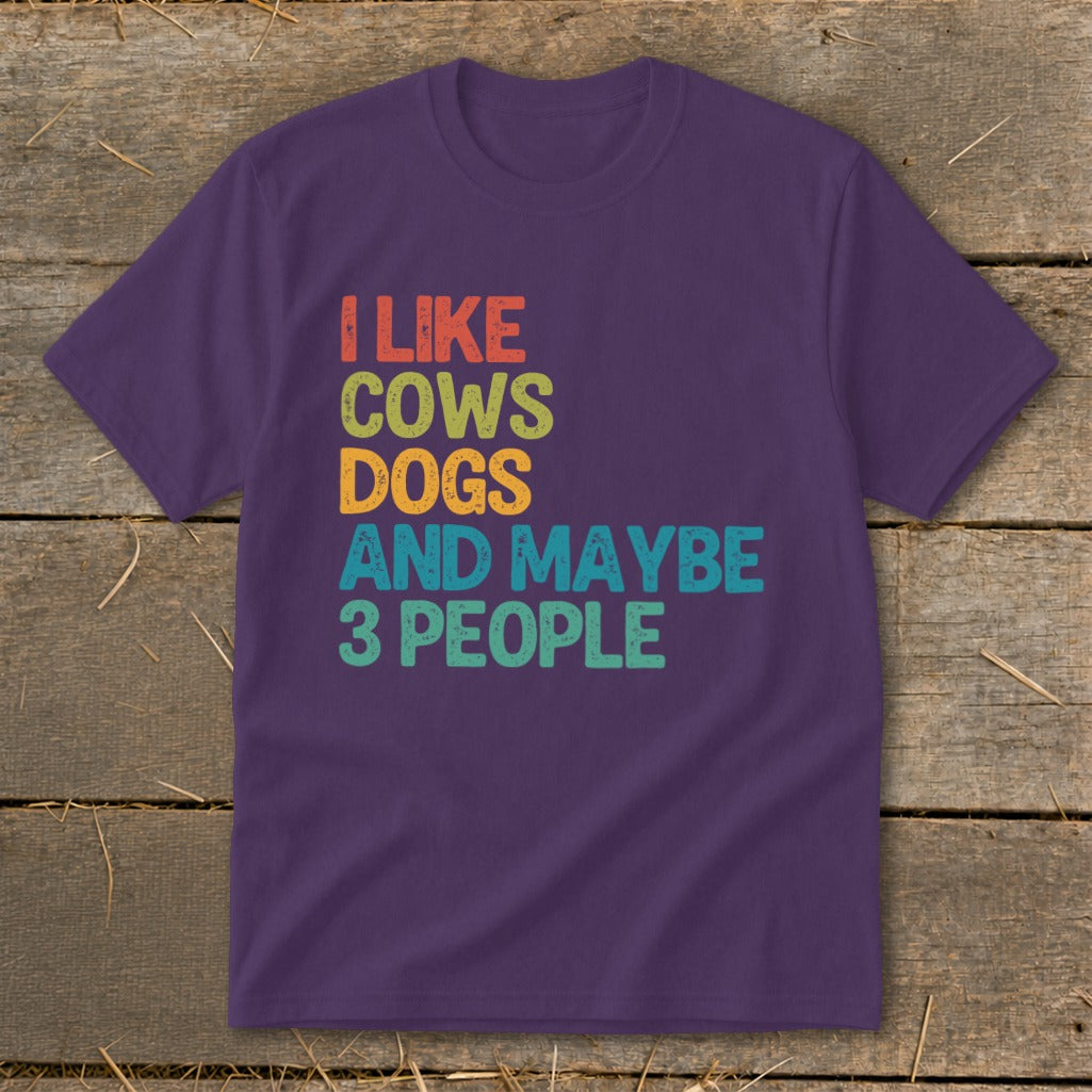 Purple t-shirt with "I Like Cows, Dogs, and Maybe 3 People" text.