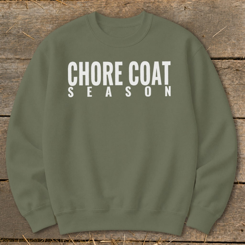 Olive green sweatshirt with "CHORE COAT SEASON" in white text.
