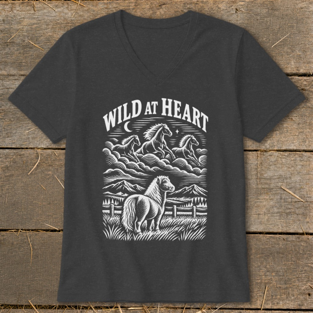 Dark gray t-shirt with "Wild at Heart" graphic of horses running in clouds and a pony in a field.