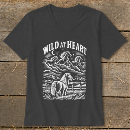 Dark gray t-shirt with "Wild at Heart" graphic of horses running in clouds and a pony in a field.