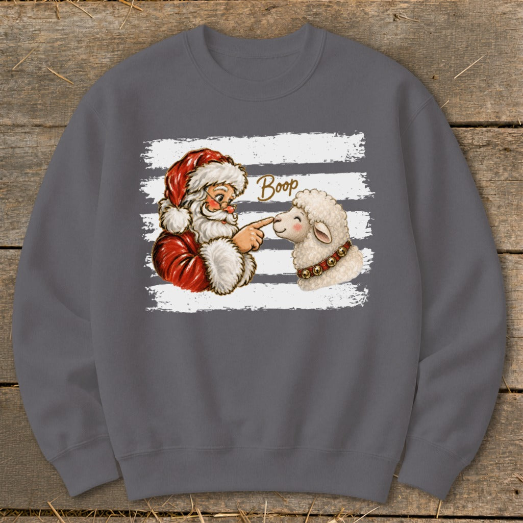 Santa booping a sheep with the word "Boop" above.