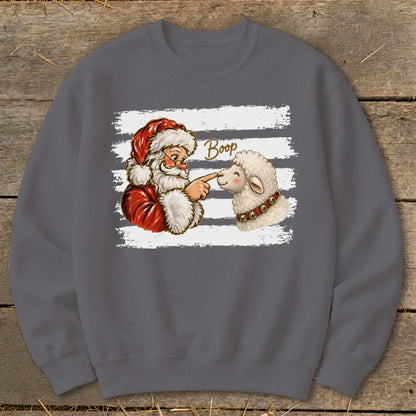 Santa booping a sheep with the word "Boop" above.