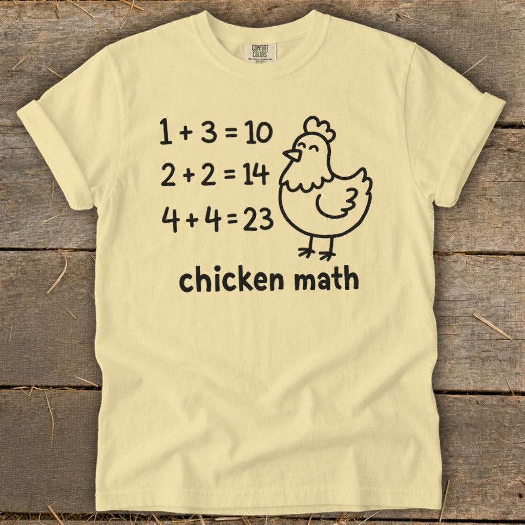 Light yellow t-shirt with "chicken math" text, a chicken graphic, and humorous math equations.