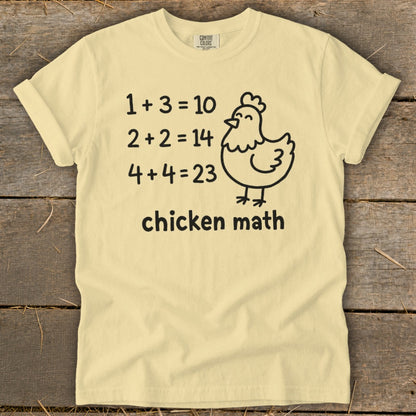 Light yellow t-shirt with "chicken math" text, a chicken graphic, and humorous math equations.