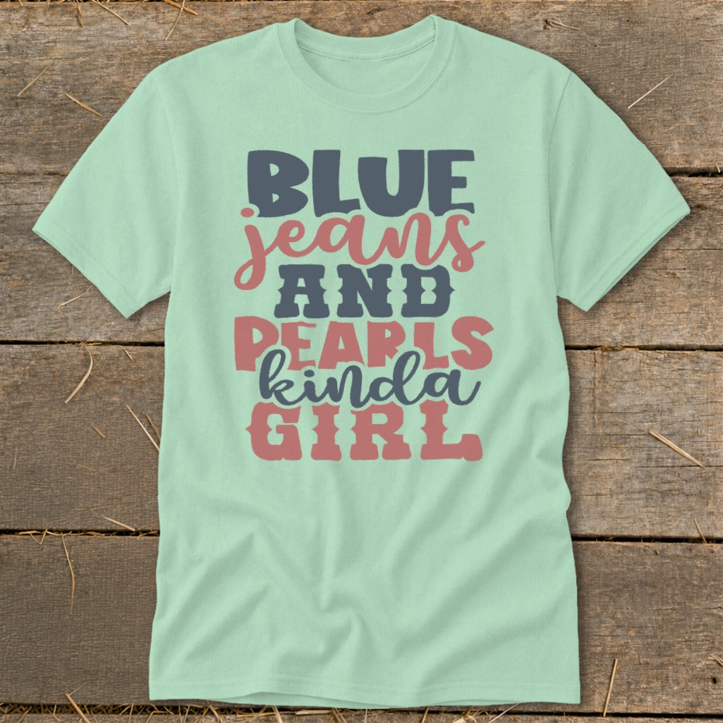Light blue t-shirt with "BLUE jeans AND PEARLS kinda GIRL" text design.