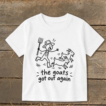 White t-shirt with stick figure farmer chasing escaped goats, text "the goats got out again".