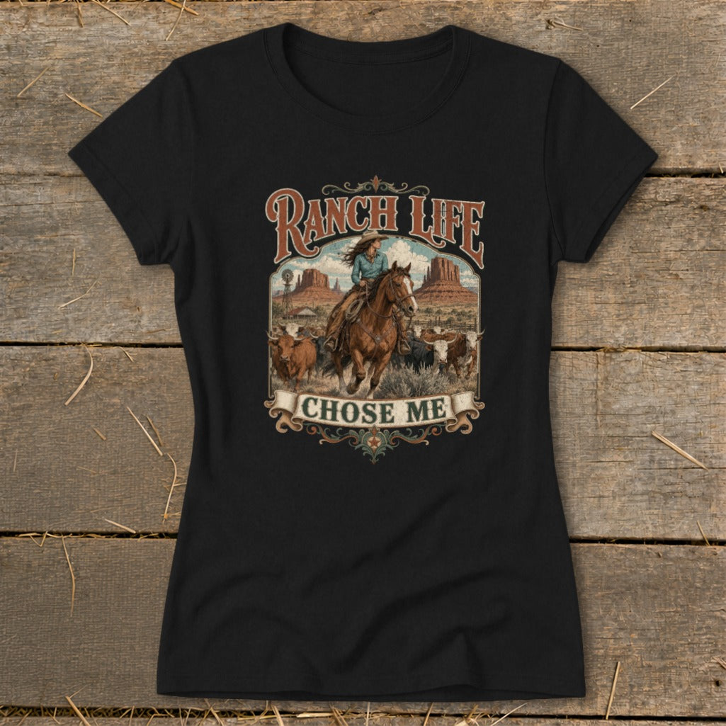Ranch Life graphic tee with a cowgirl on horseback and cattle.