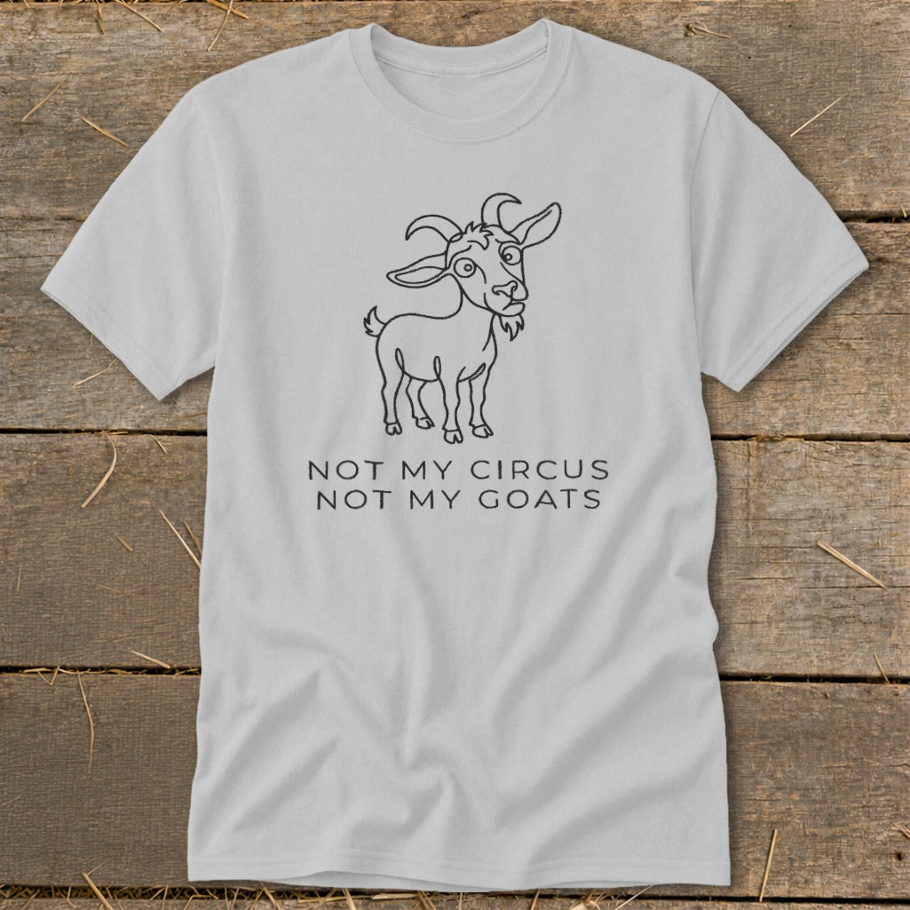 Light grey t-shirt with black line drawing of a goat and text "Not My Circus, Not My Goats".