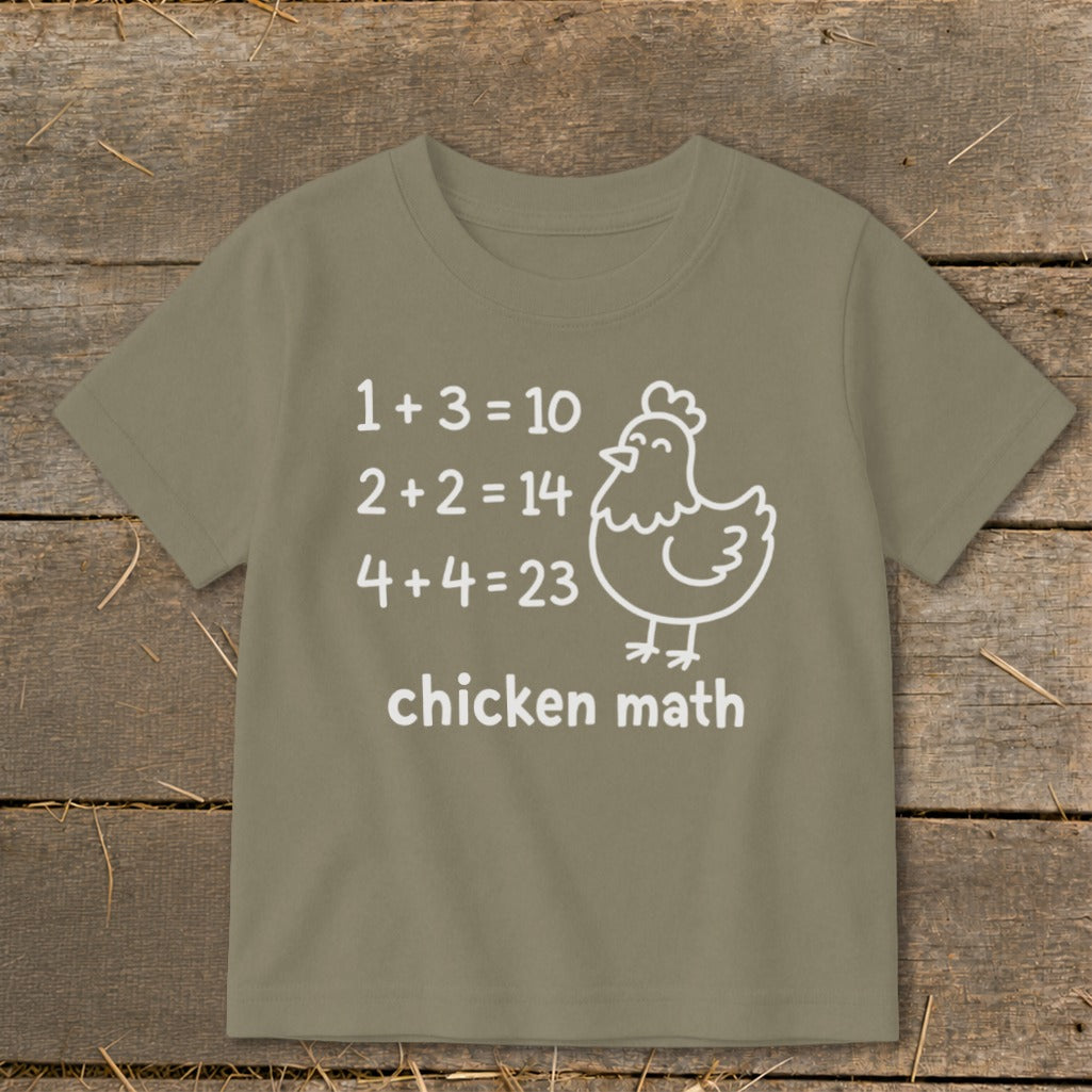Kid's t-shirt with "chicken math" joke and math equations with a cartoon chicken.