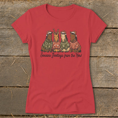 Red t-shirt with four horses in Santa hats and sweaters, reading "Seasons Greetings from the Herd".