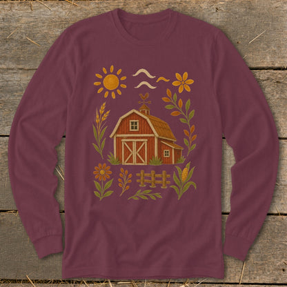 Maroon long sleeve shirt with a barn, sun, and floral farm illustration.