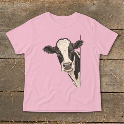 Pink t-shirt with a black and white cow peeking from the side.