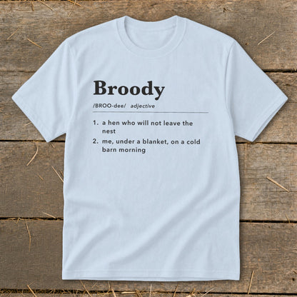 Light blue t-shirt with "Broody" definition: a hen or you under a blanket.