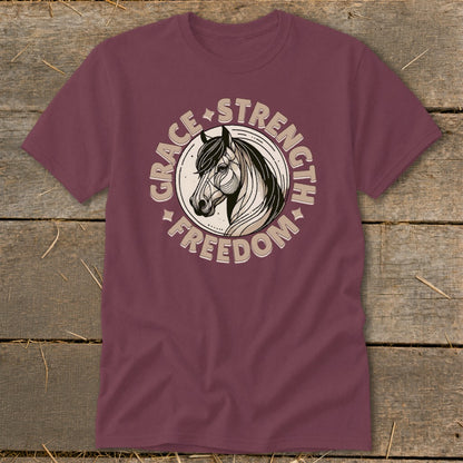Maroon t-shirt with a horse head illustration surrounded by "Grace, Strength, Freedom."