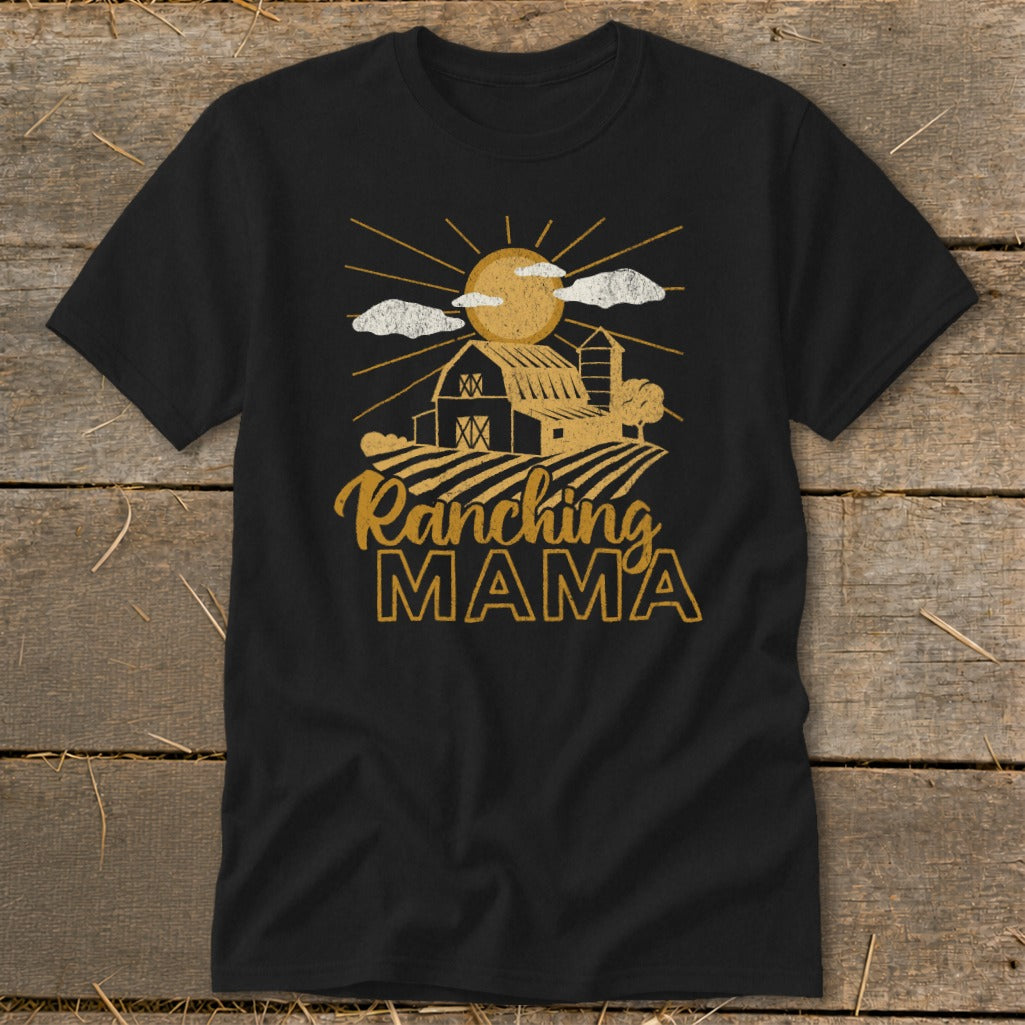Black t-shirt with graphic of a barn and fields that says "Ranching MAMA".