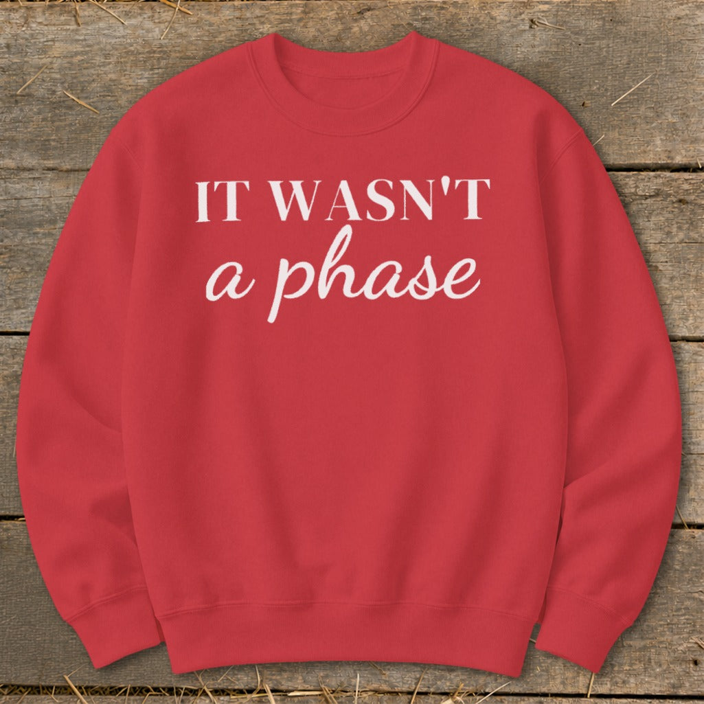 Red crewneck sweatshirt with white text "IT WASN'T a phase".